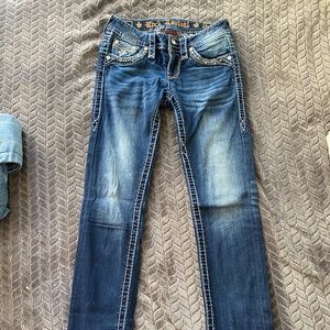 Rock revival dark blue jeans.